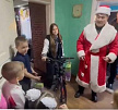 Детей города Свердловска Луганской Народной Республики поздравляет тувинский Дед Мороз